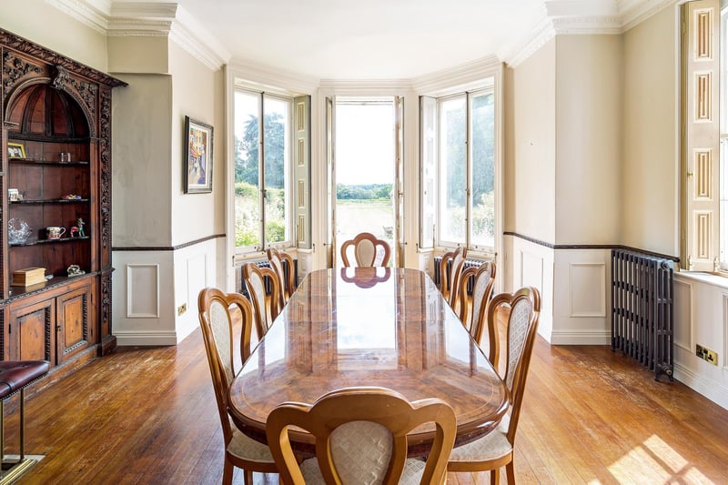 Did someone say ready to entertain? Imagine it: You and your closest friends gather around this huge table overlooking your landscaped gardens, enjoying a feast for the ages and maybe a board game or two. This room was practically made to have guests making memories in it.