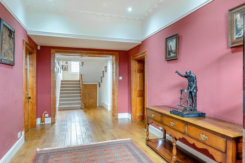 The hallway takes you into the main house, with a sitting room, snug and office to the left and right. Sadly, we don't think the statue will be staying...