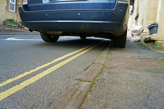 Parking to load or unload on double yellow lines is only permitted if the load is of sufficient volume, weight or difficulty – collecting a newspaper from a shop doesn’t count.