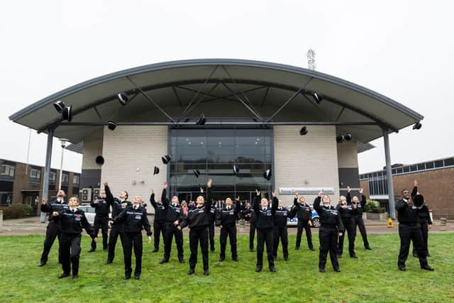 New recruits throw their hats at their ceremony