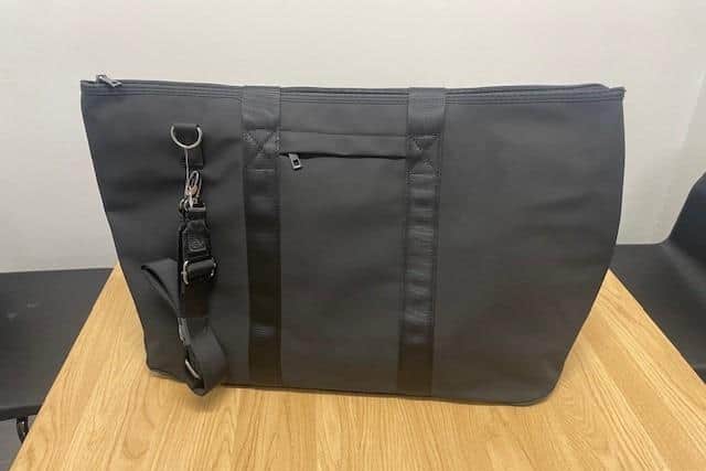 Police believe Daniel is in possession of this bag