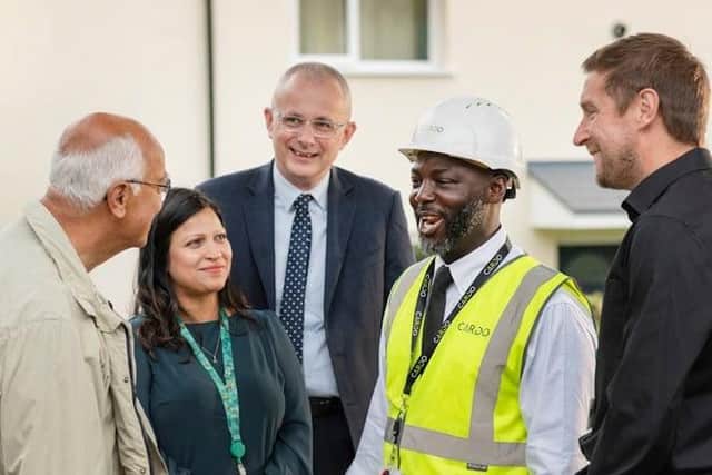 Caption: L - R Dacorum Mayor Cllr Garrick Stevens, Portfolio Holder for Housing and Property Services, Cllr Simy Dhyani, Dacorum Borough Council Chief Executive Darren Welsh with Cardo engineer and Ricky Lang, Head of Safe Homes.