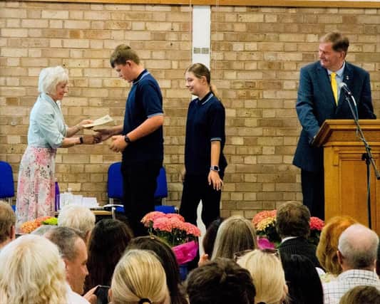 The Deputy Lieutenant awards prizes to senior pupils