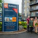 Bellway Sales Manager Zoe Dobbs (far right) welcomes project worker Tom Roberts (far left)