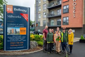 Bellway Sales Manager Zoe Dobbs (far right) welcomes project worker Tom Roberts (far left)