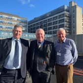Hemel MP Sir Mike Penning (centre)