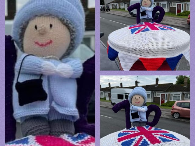 Woollen Queen figure with a small black handbag on a knitted postbox topper.
Photo: Chris Allsop