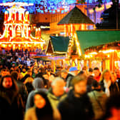 There's nothing warming yourself with a hot drink walking around Christmassy stalls on a wintery evening! Picture: Christopher Furlong/Getty Images