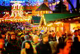 There's nothing warming yourself with a hot drink walking around Christmassy stalls on a wintery evening! Picture: Christopher Furlong/Getty Images