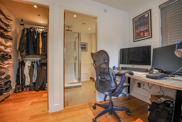 The groundfloor office comes complete with a walk-in wardrobe.