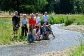 : Councillors and Council officers reviewing the progress of the River Gade restoration Back Row Lt to Rt: Liam Dennis, Project Manager (Environment Agency), Stefania Horne - Strategic Director (Neighbourhood Operations), Cllr Sally Symington – Leader of the Council, Cllr Neil Harden, Darren Welsh - Chief Executive Front Row Lt to Rt: Cllr Simy Dhyani, Cllr Caroline Smith-Wright, Cllr Robin Bromham, Cllr Adrian England
