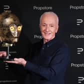 Star Wars actor Anthony Daniels with his C-3PO head from Return of the Jedi.