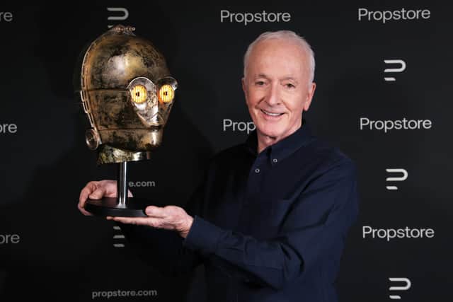 Star Wars actor Anthony Daniels with his C-3PO head from Return of the Jedi.
