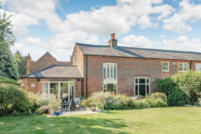 Starting outside, this idyllic house sits over 3,000 square feet and has eight rooms.