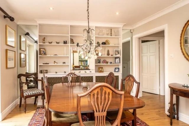 The relatively small (in comparison) dining room sits across from the kitchen and breakfast room