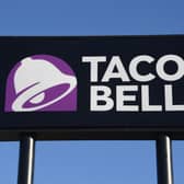 An exterior view shows a sign at a Taco Bell restaurant  (Photo by Ethan Miller/Getty Images)