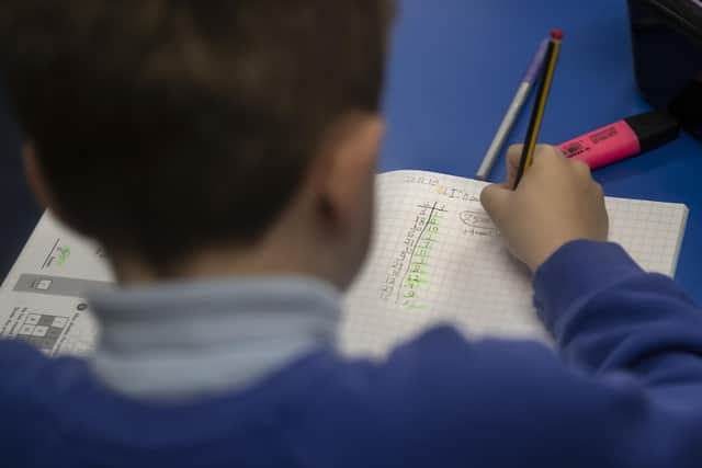 The Government aims for 90 per cent of key stage two children to meet the expected standard in reading, writing and maths. Image: Danny Lawson/PA Wire