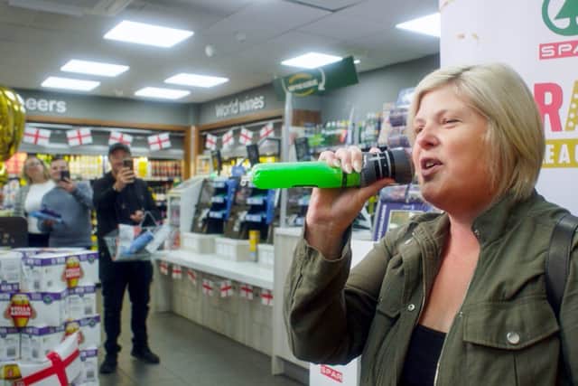 Customer taking part in SPARaoke
