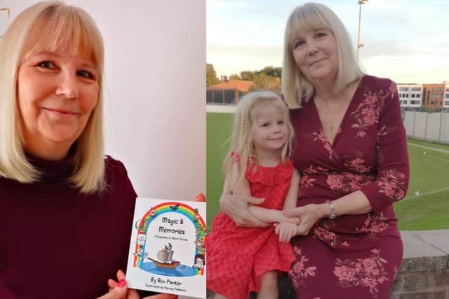 Pictured: Ann with her book and her granddaughter