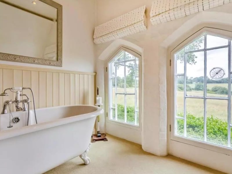 Imagine taking a bath and looking out at that view!
