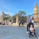 David, Alex and Lexi Robins, from Hemel Hempstead in Hertfordshire, at the Houses of Parliament. Credit: Will Durrant/LDRS