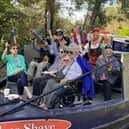 Residents and members of the team from Water Mill House care home aboard the canal boat