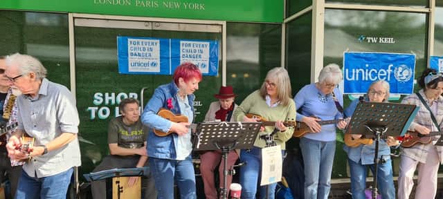 Katie's Jumping Fleas taking part in BURP's Big Busk on Berkhamsted High Street in aid of Unicef's earthquake appeal