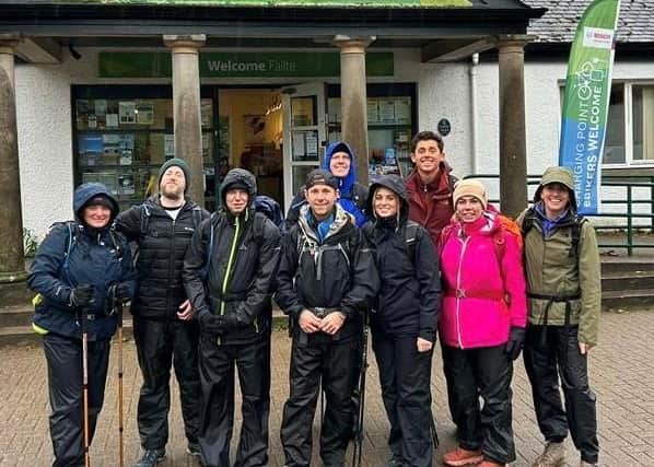 The 11-strong team battled through stormy weather to complete the Three Peaks.