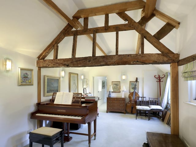 The extensive and flexible accommodation in the main house extends to around 4,000 sq ft with beautiful exposed timbers