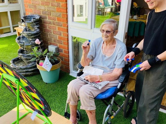 Marion 97 years young giving it her best shot
