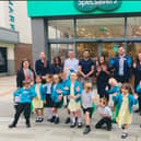 Pupils from Year 1, Jupiter Primary School, (L to R back row) Ms Ria Perry, Year 1 Teacher, Louise England, General Manager, Geeta Patel, Audiology Director, Ash Patel, Ophthalmic Director, Shyam Suchak, Ophthalmic Director, Amy Patel, Optometrist, Harry Hutchings, Hearcare Assistant & Priti Amrania, PR & Community Engagement Lead 