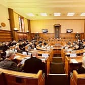 Pictured: Councillors pay their respects.