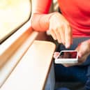 Person on a mobile phone. Photo: Adobe