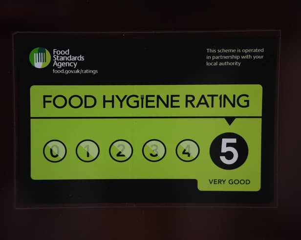 A Food Standards Agency rating sticker on a window of a restaurant in central London. Image: Victoria Jones