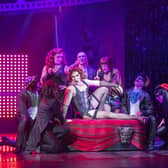 Stephen Webb as Frank N Furter and the cast of The Rocky Horror Show