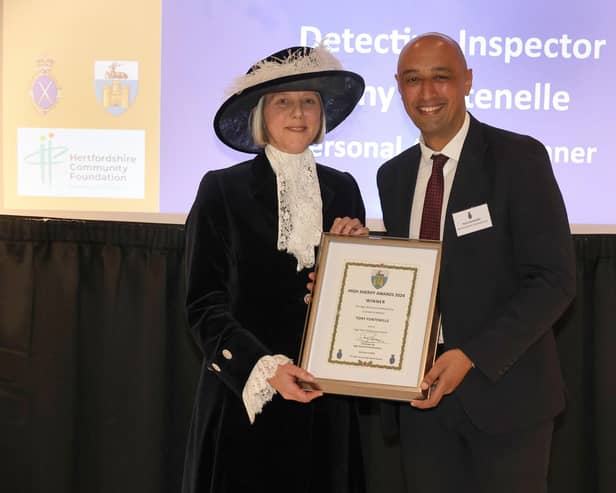 DI Fontenelle receiving the award from the High Sheriff for Hertfordshire.