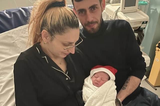 New parents with baby Eve