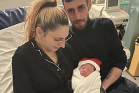 New parents with baby Eve