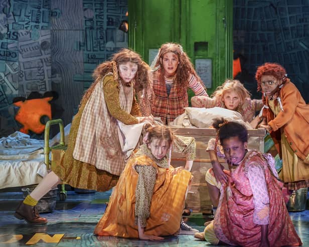 Zoe Akinyosade (Annie) and company (photo: Paul Coltas). Annie was played on the opening night by Harlie Barthram