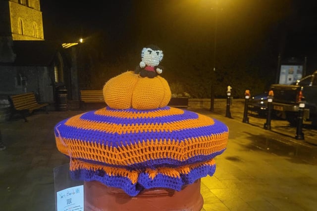 All the way from Transylvania, Dracula sits on a pumpkin in Hemel