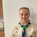 Pictured: Amy in her Scout uniform.