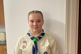 Pictured: Amy in her Scout uniform.
