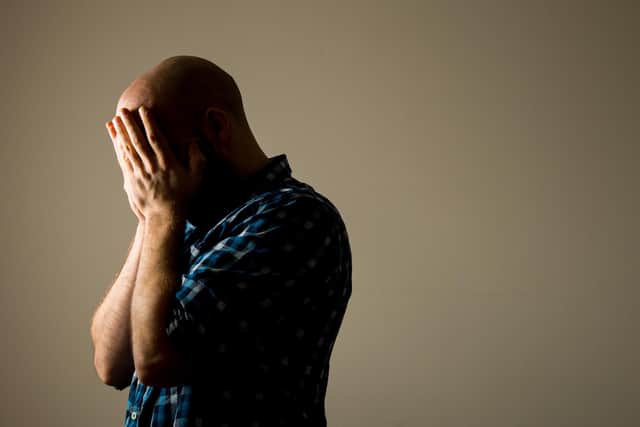 PICTURE POSED BY MODEL File photo dated 09/03/15 of a man showing signs of depression
