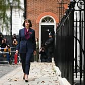 Britain's Chancellor of the Exchequer Rachel Reeves carries the red Budget Box as she leaves 11 Downing Street on October 30, 2024 (Photo by Justin Tallis - WPA Pool/Getty Images)