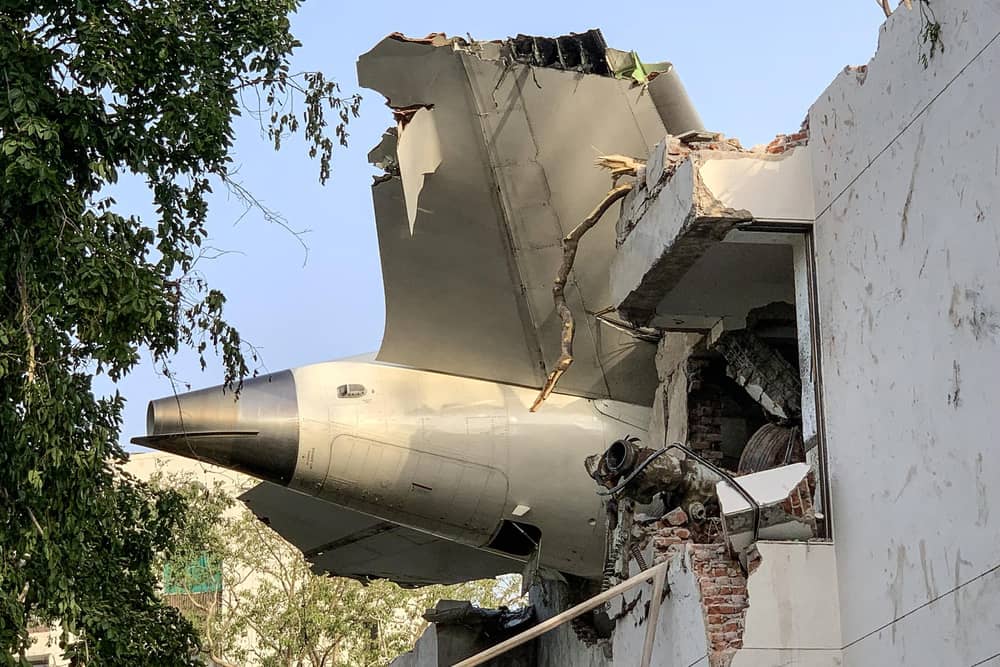 The back of Air India flight 171 is pictured at the site after it crashed in a residential area near the airport in Ahmedabad. Picture: Sam Panthaky/AFP via Getty Images