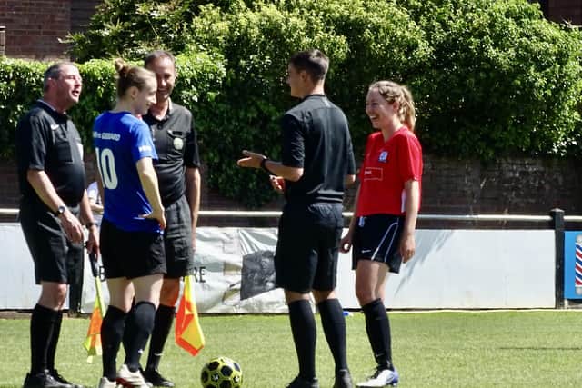Amy (left) and Ashleigh (right) with match officials.