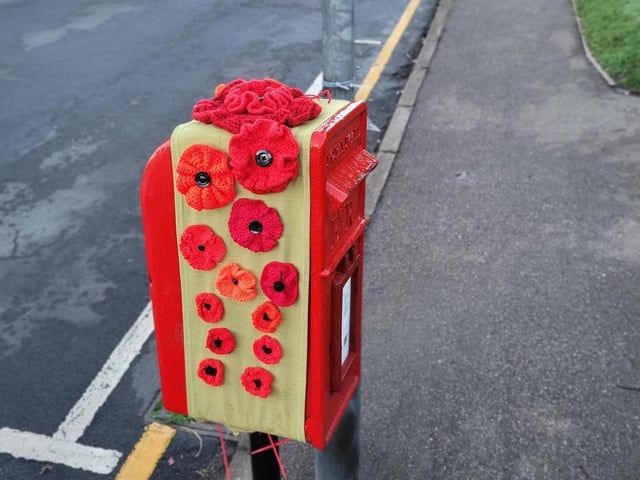 This post box is covered in red poppies - the symbol of Remembrance and hope for a peaceful future.