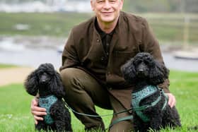 Chris with his own Poodles, Sid and Nancy