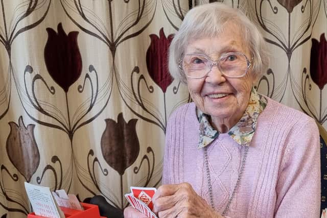 Joan has been a bridge club member for 25 years.