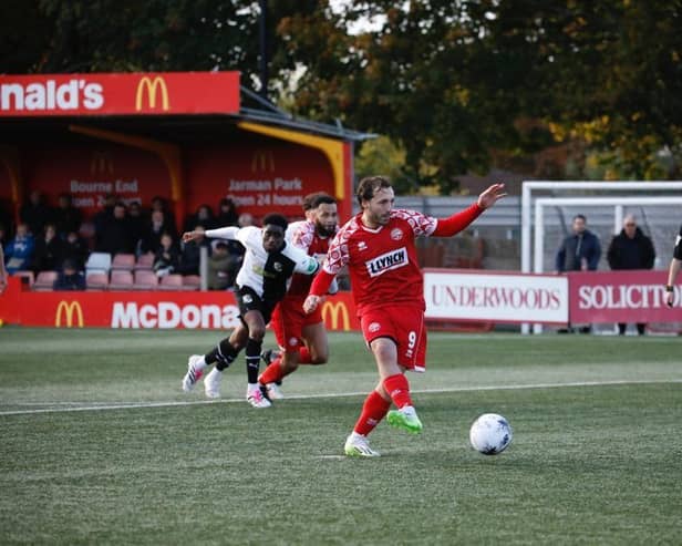 Joe Iaciofano strokes home the winner from the spot. Photo: HHTFC.